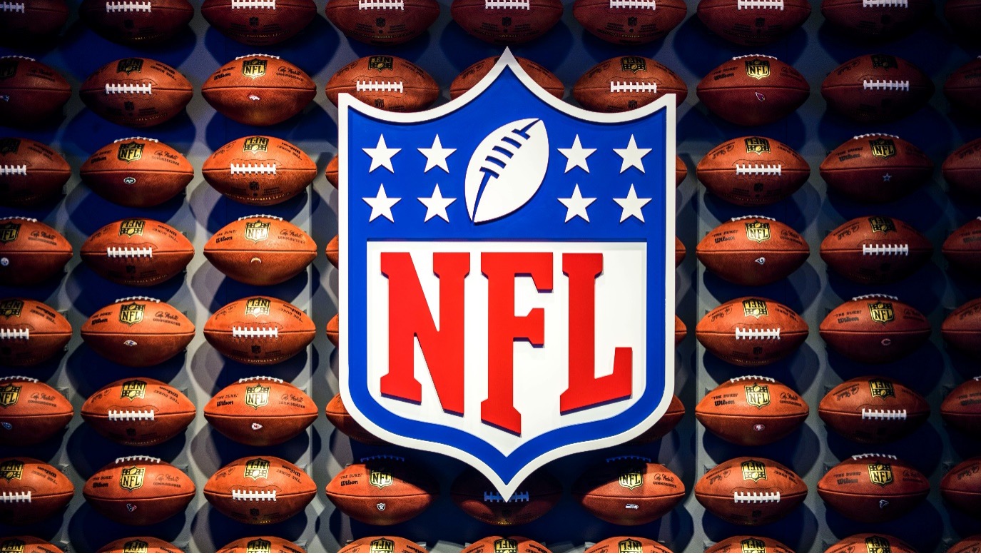 NFL logo with surrounding footballs