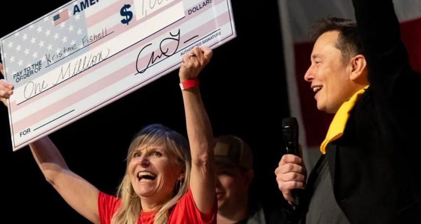 Elon Musk with oversized check