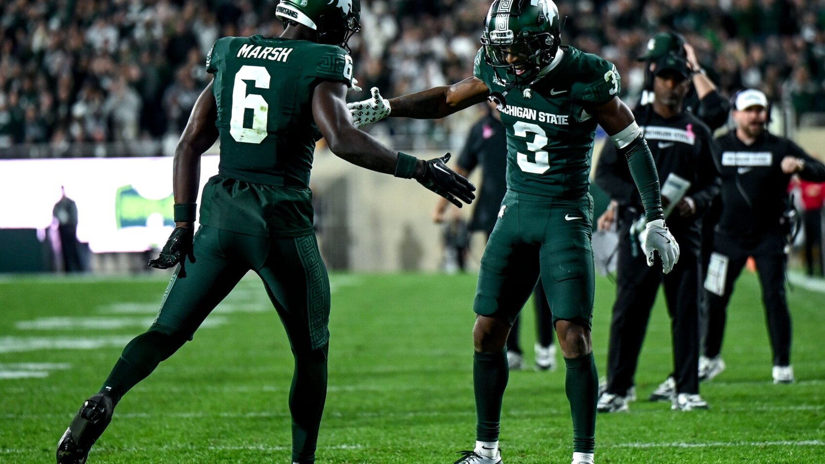 MSU player celebrates scoring touchdown