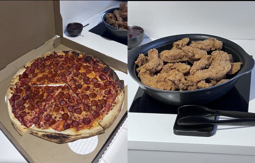 Pizza and wings on stovetop