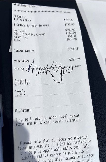 Restaurant receipt showing handwritten tip