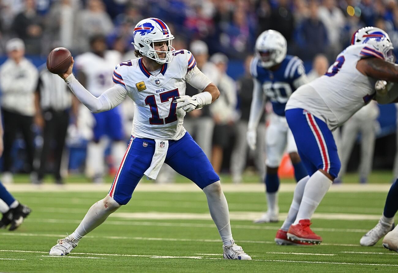 NFL quarterback throwing football downfield