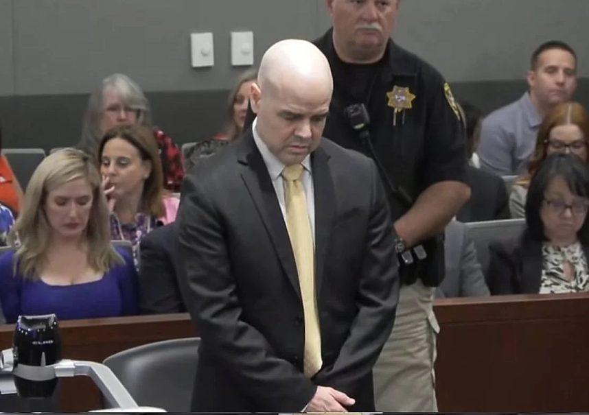 Man stands in courtroom