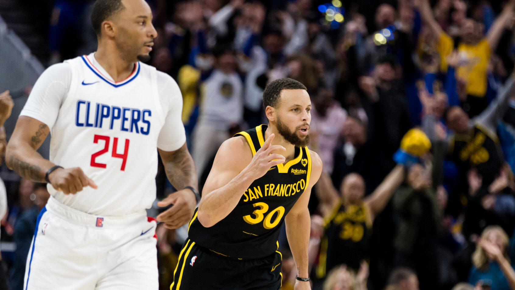 Two basketball players in action