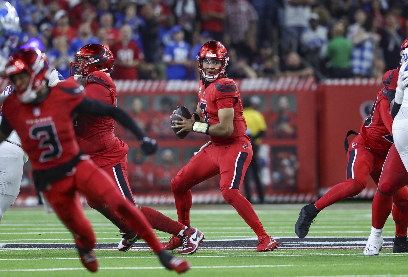 Quarterback readies throw during NFL game