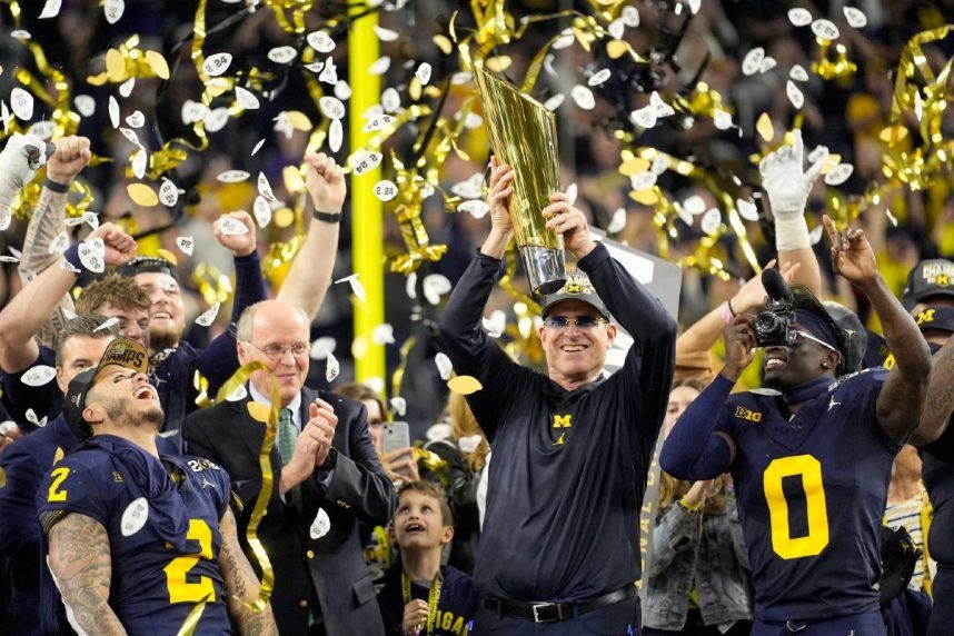 Michigan Wolverines celebrating national championship victory