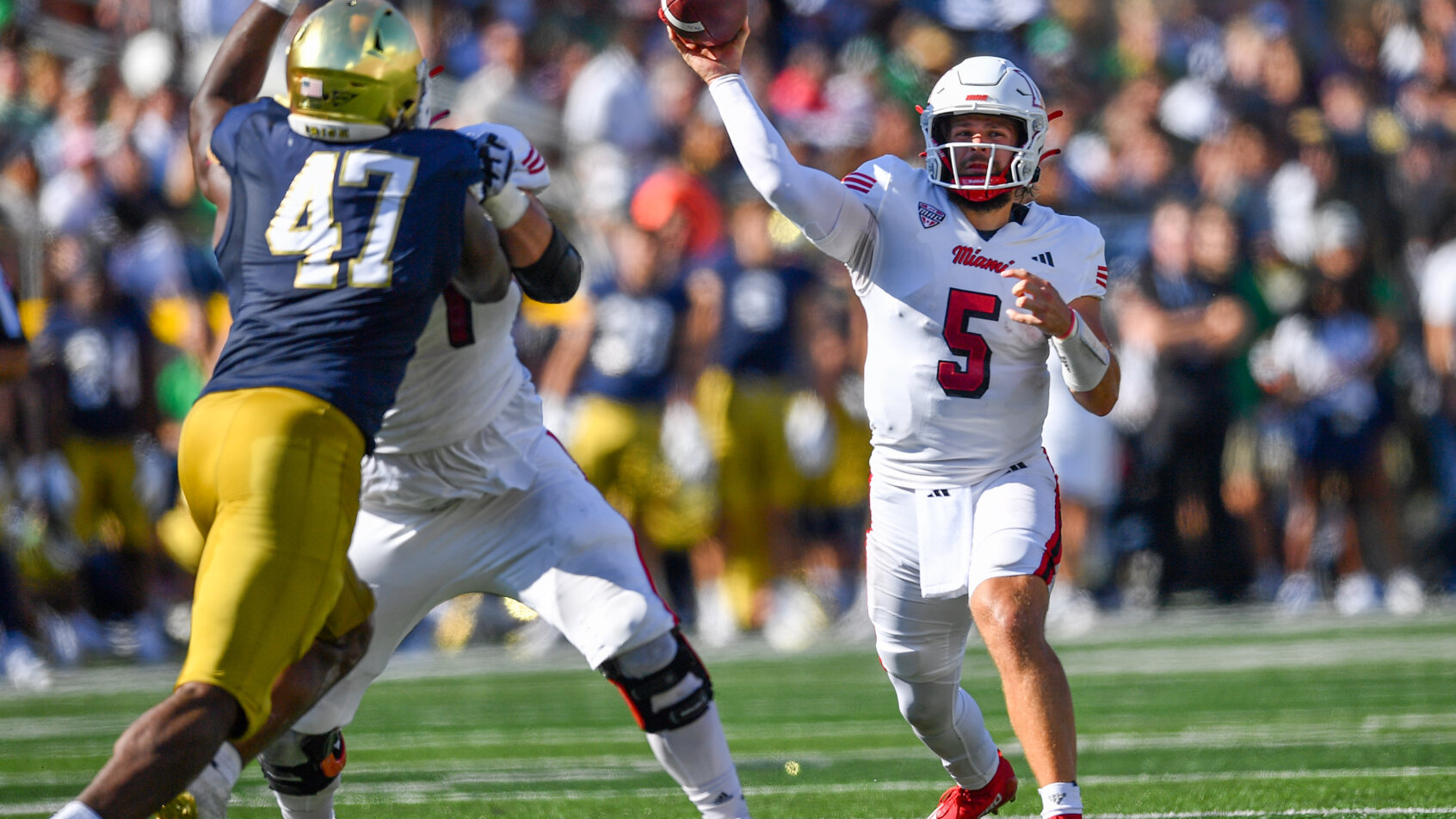 Football player rushing through defenders