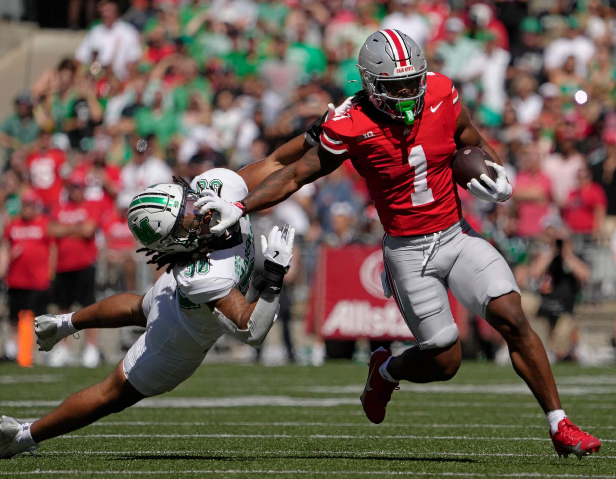 NFL player sprinting with football