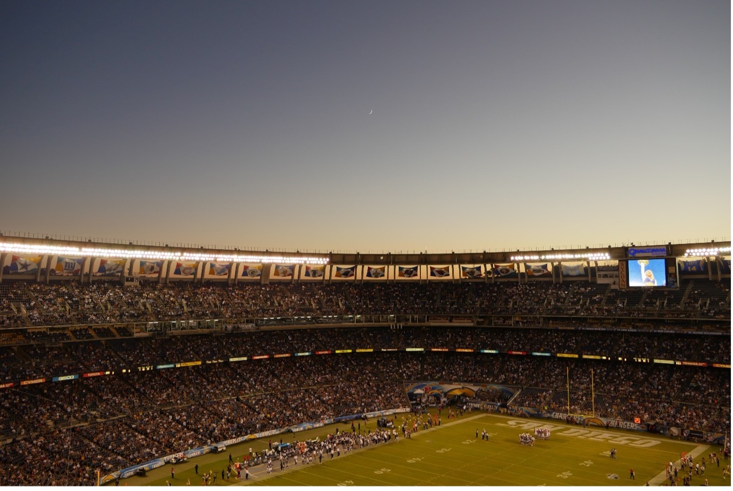 Football stadium with green field