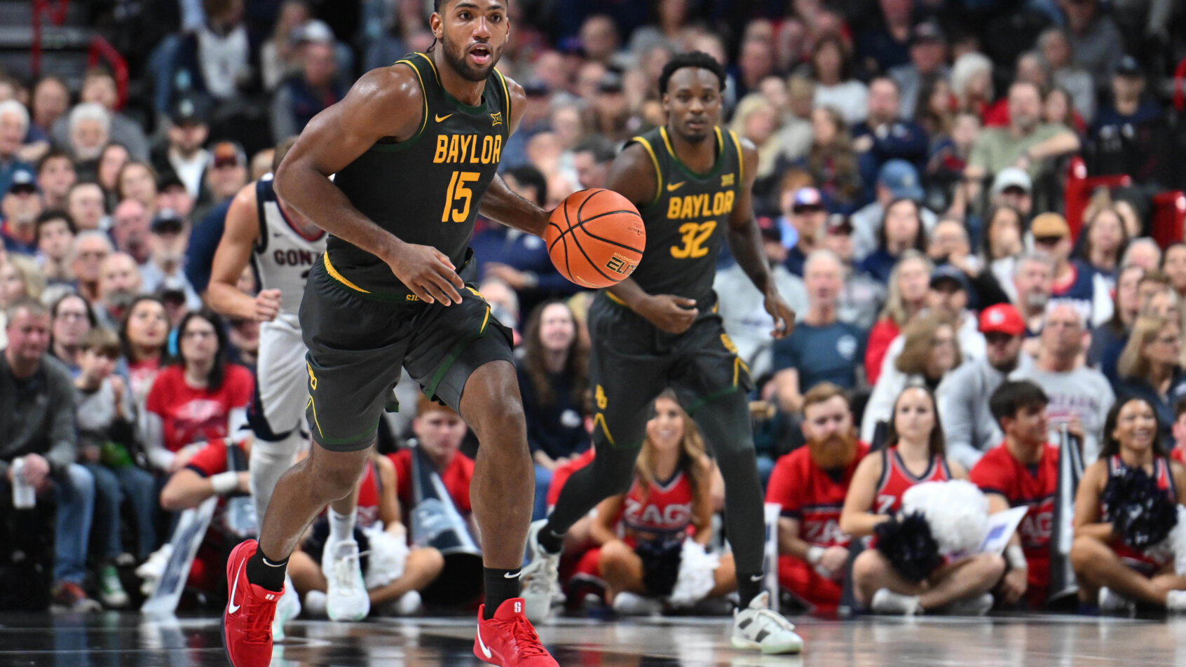 Baylor players jump for basketball shot