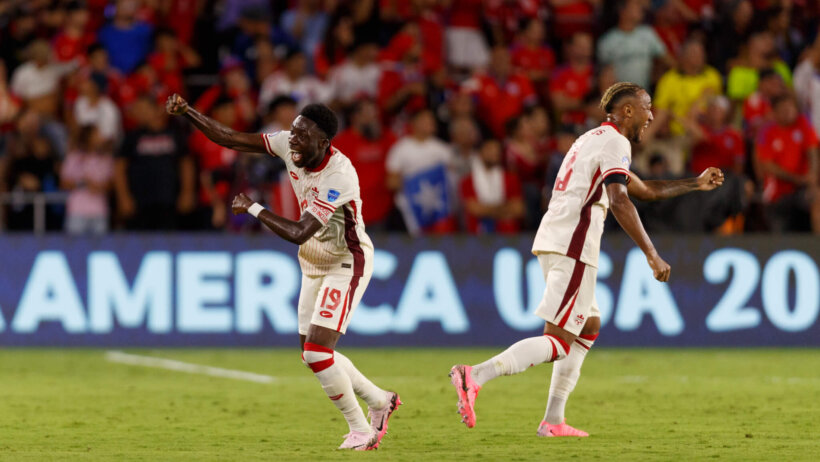 Soccer teammates celebrate goal together