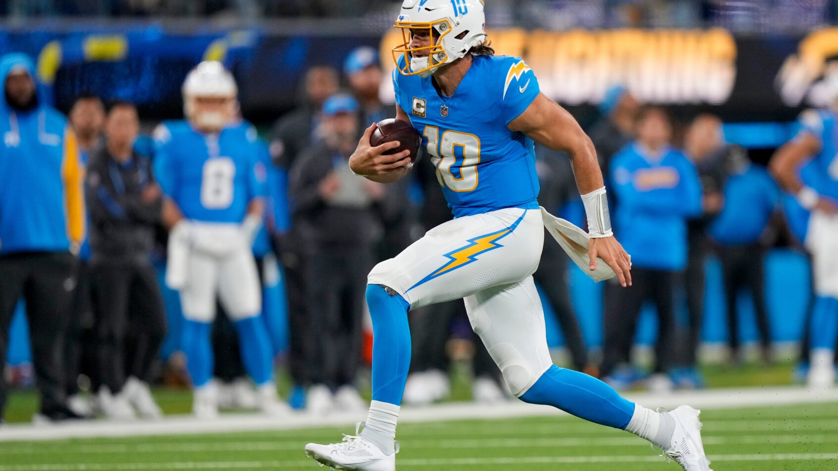 Football player sprinting during game