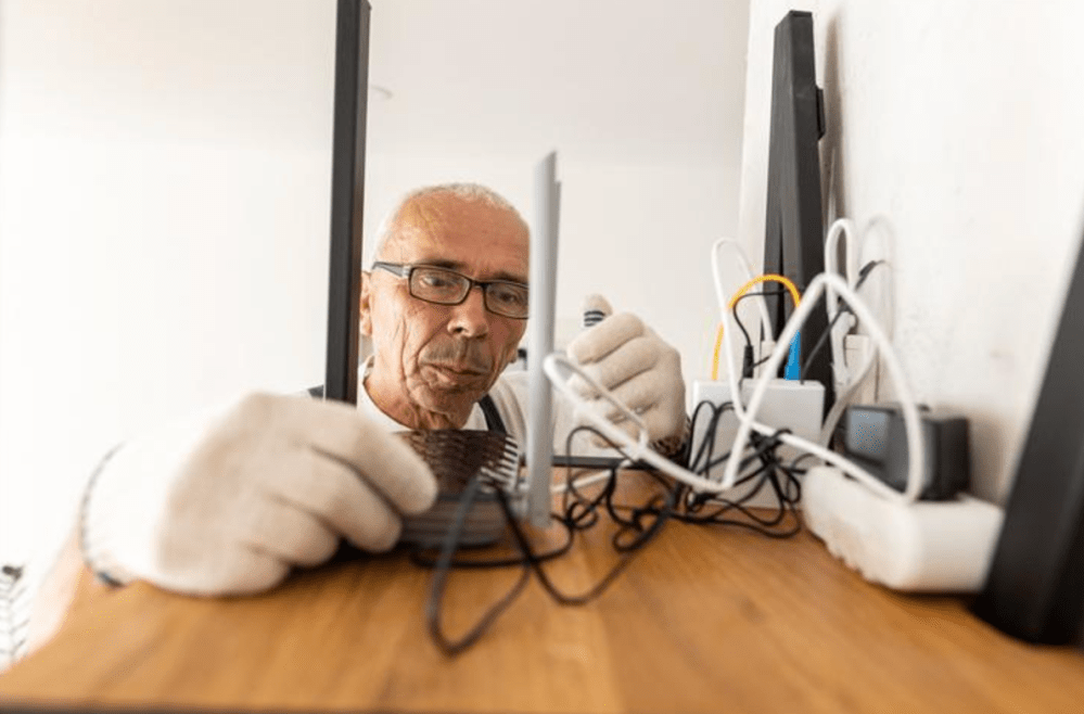 Man at desk with computers