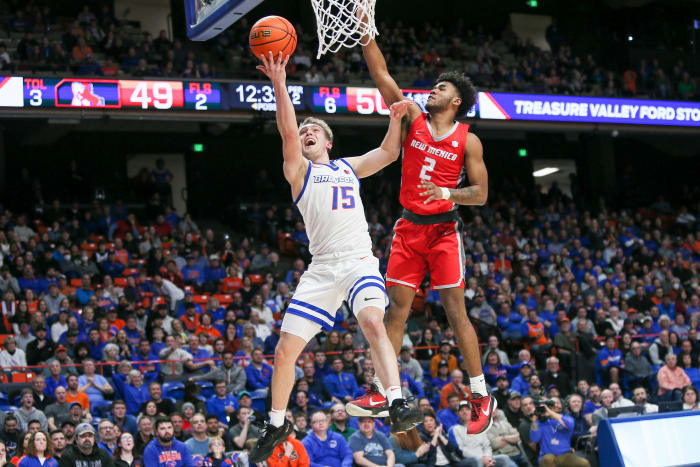 Basketball player leaping for shot