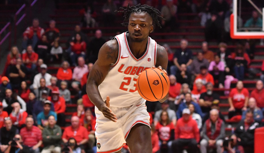 Basketball player dribbling during game