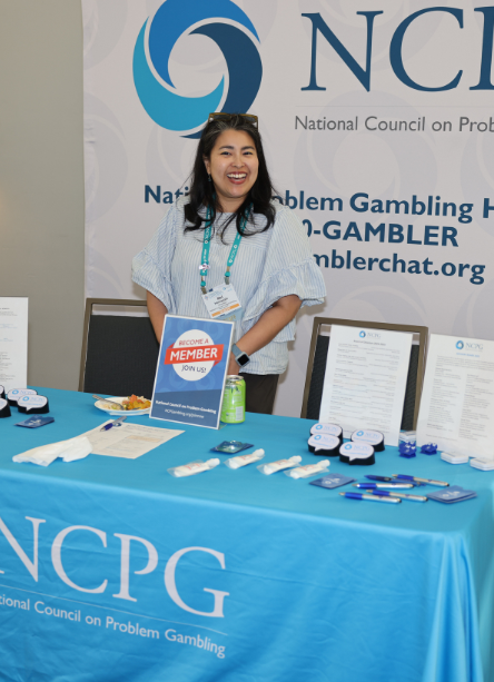 Woman at NCPG information table