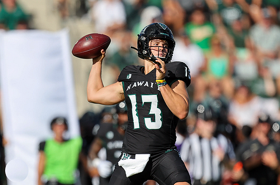 Football player throwing a pass