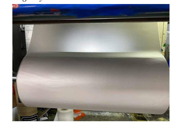 Large white industrial paper roll