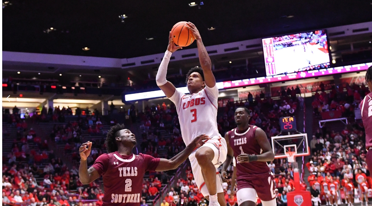 Player jumping to score basket