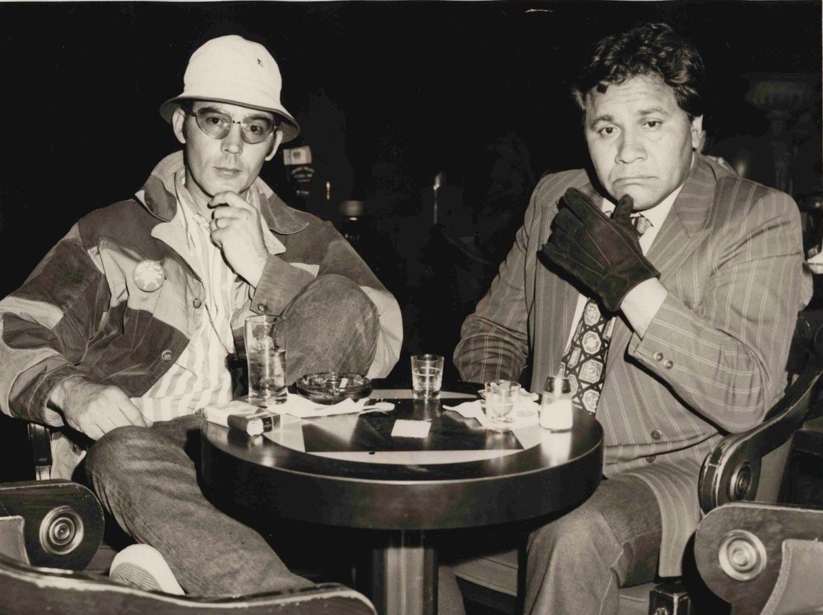 Two men sitting at casino table