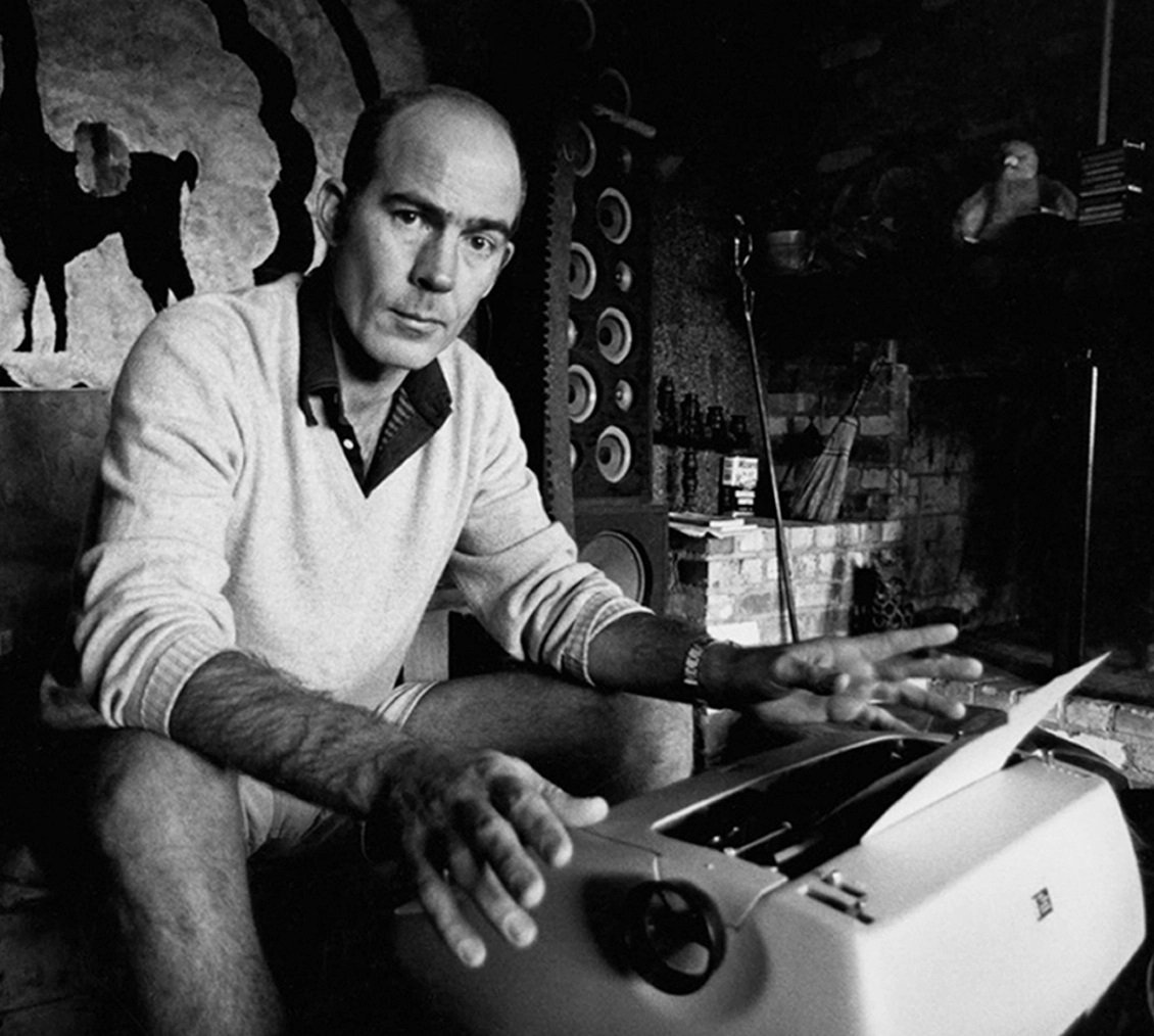 Hunter Thompson typing at desk