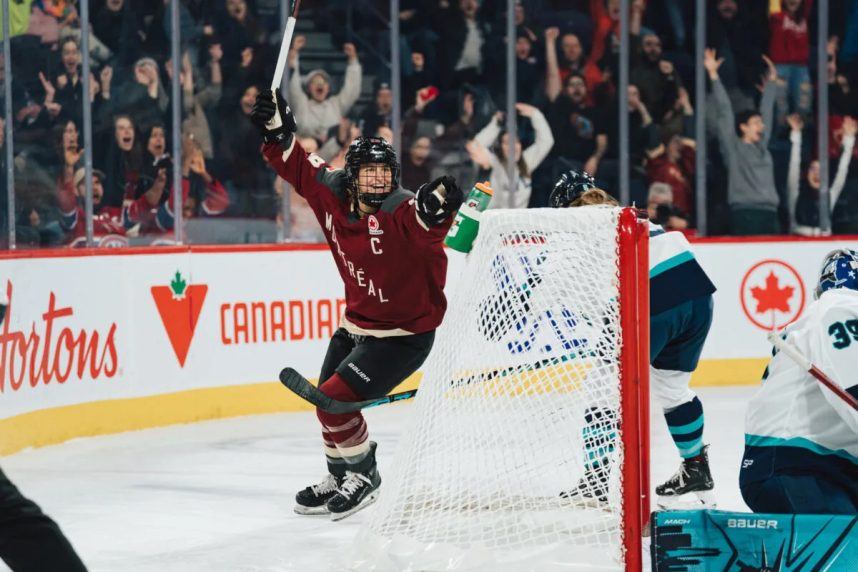 PWHL player celebrating on ice