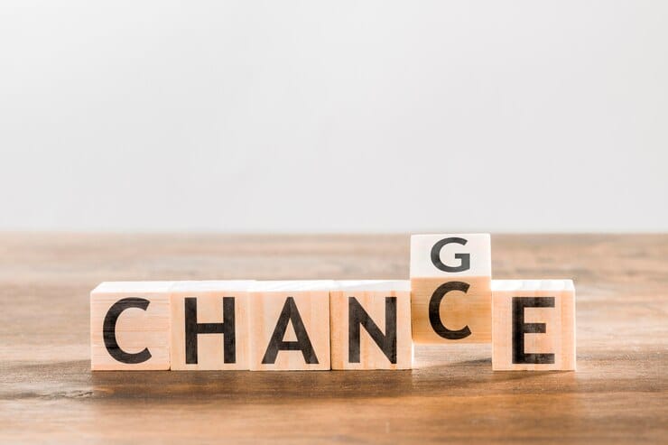 Wooden blocks spelling "CHANCE"