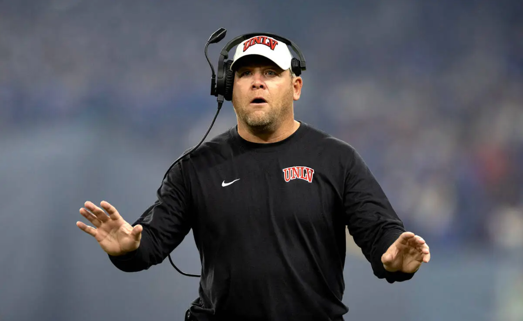 UNLV coach wearing headset