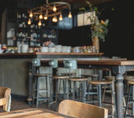 Empty bar with wooden barstools