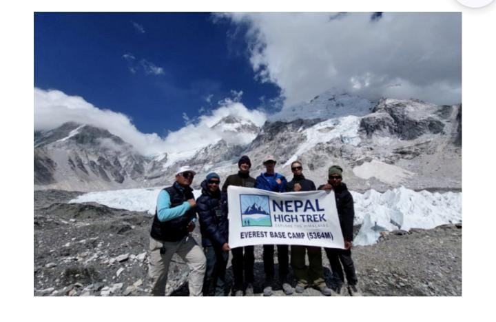 Men holding banner outdoors