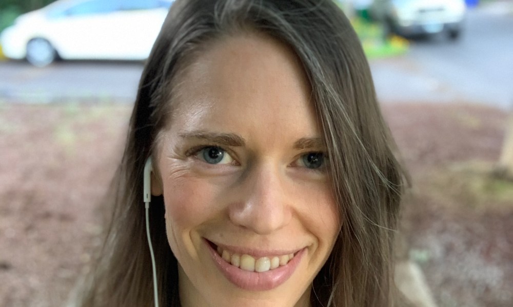 Woman smiling, professional headshot