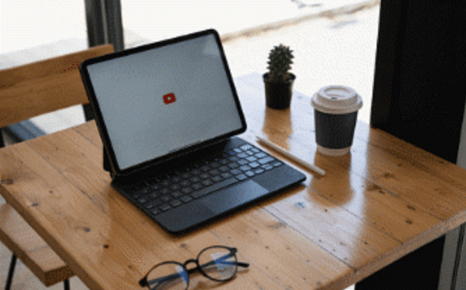 Laptop on wooden desk