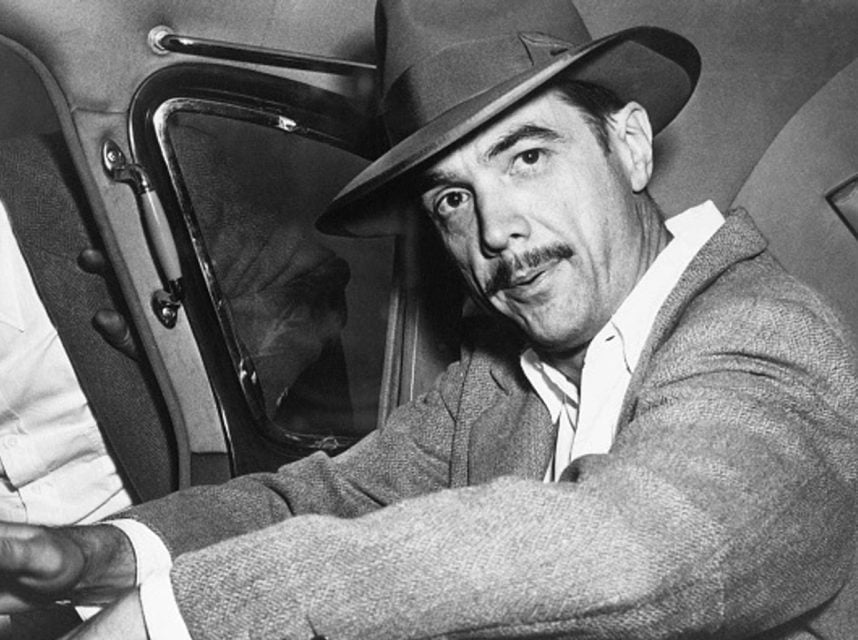 Howard Hughes sitting in car