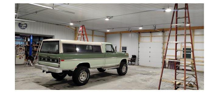 Vehicle parked inside residential garage.