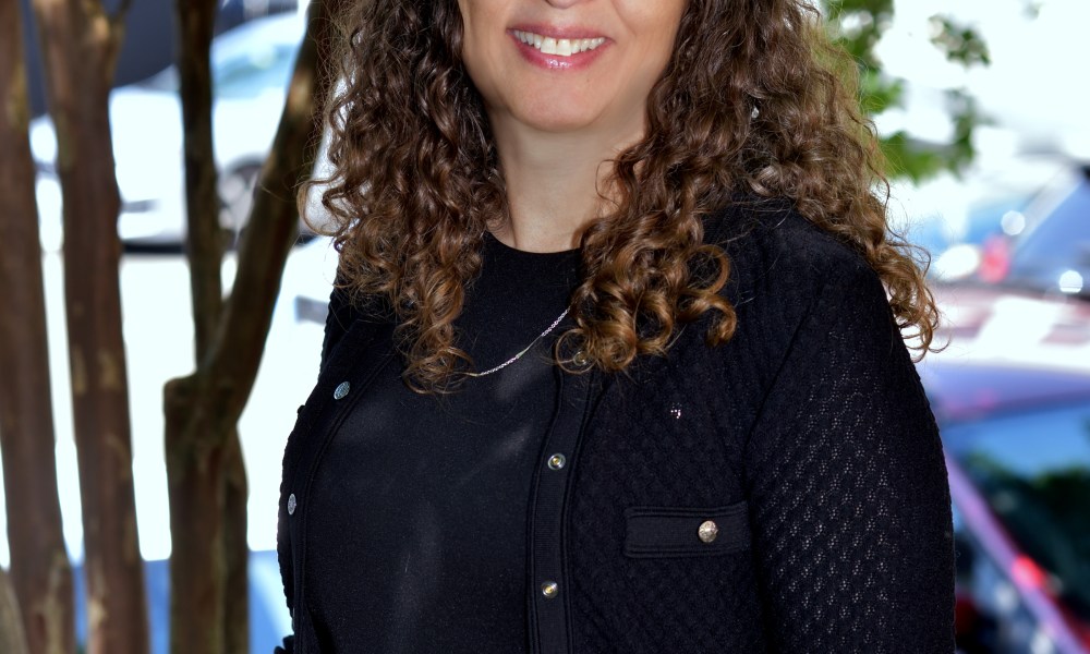 Woman with curly brown hair