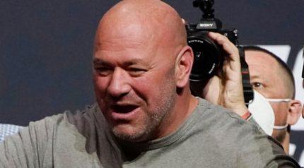 Dana White wearing grey shirt