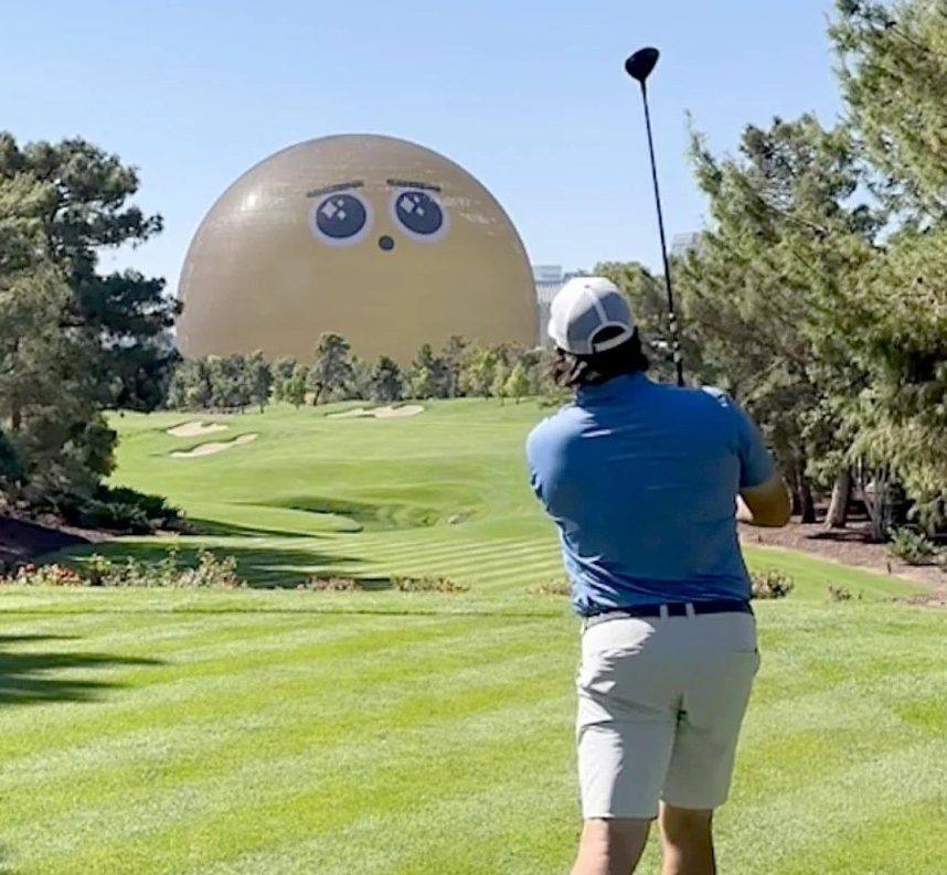 Golfer facing Las Vegas Sphere building