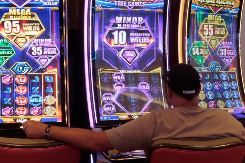 Man at Hard Rock Casino slots