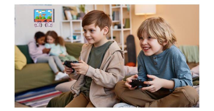 Boys gaming on couch together