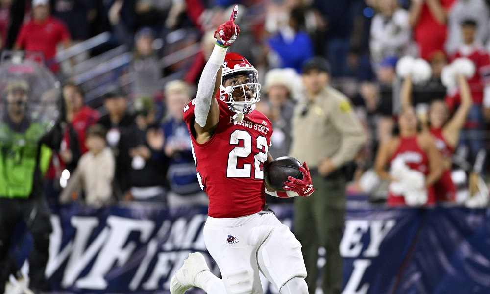 Football player celebrates touchdown victory