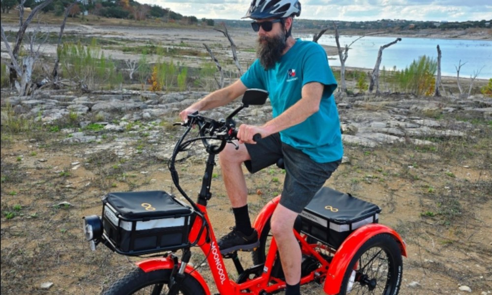 Man on red e-bike