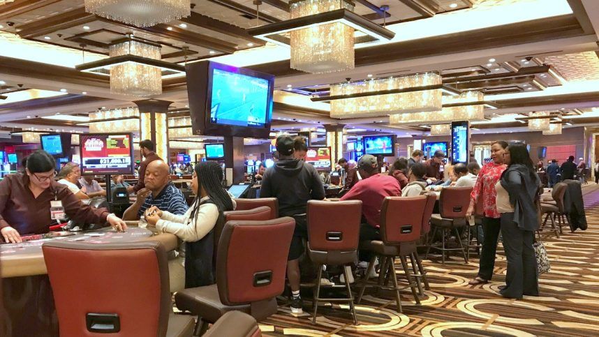 Gamblers at Horseshoe Casino gaming tables