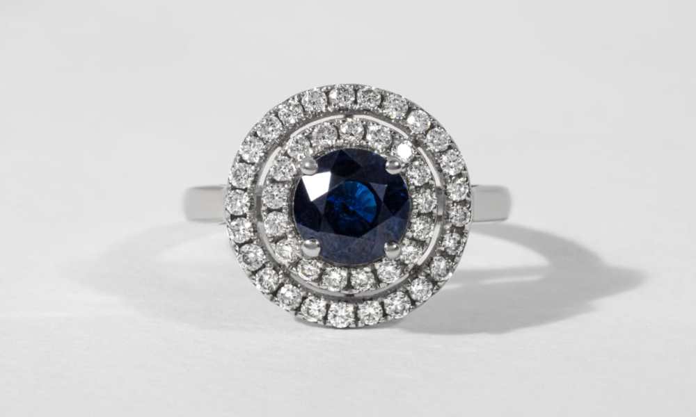 Sapphire engagement ring on white background