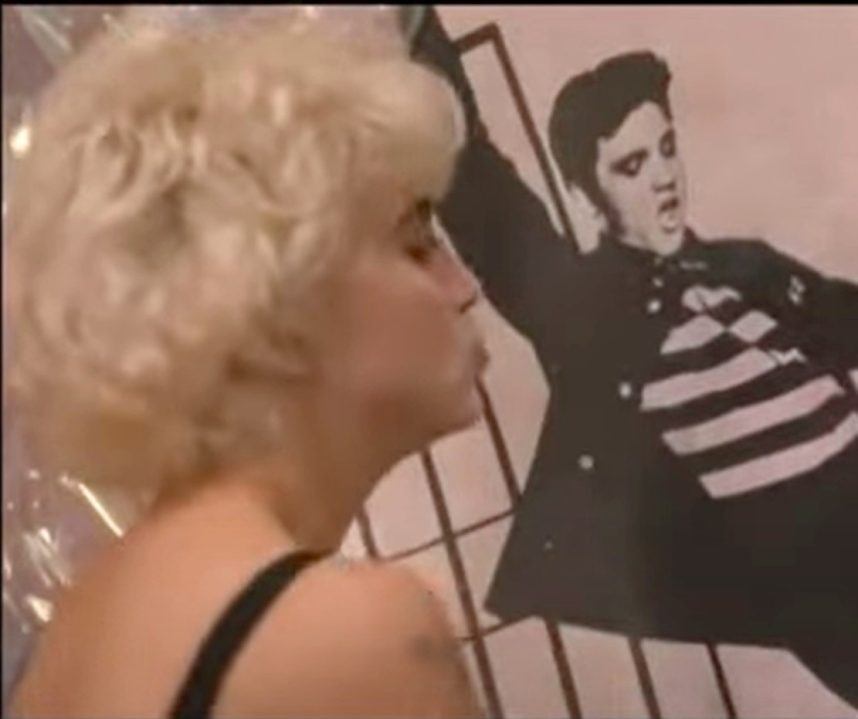 Madonna kisses Elvis Presley poster