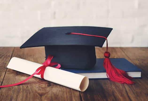 Graduation cap with diploma in sports