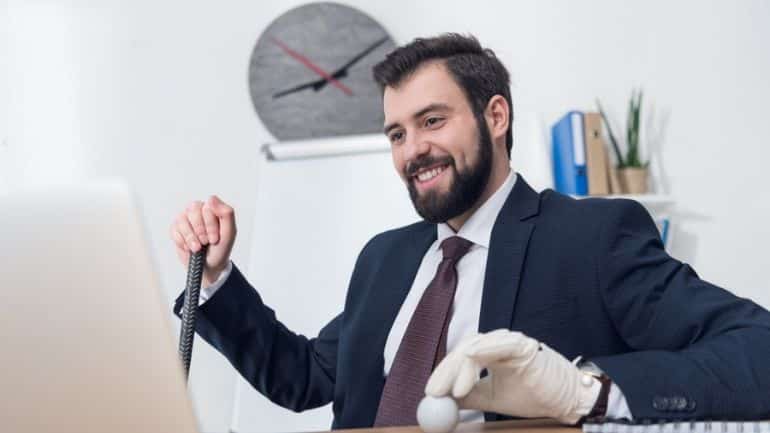 Businessman with golf equipment