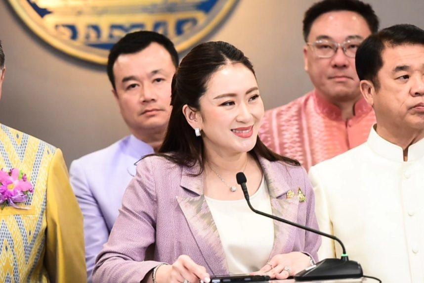 Thai politician speaking at microphone