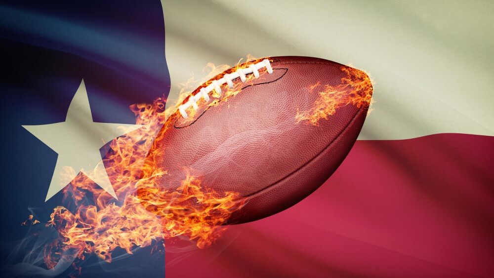 Flaming football with Texas flag background