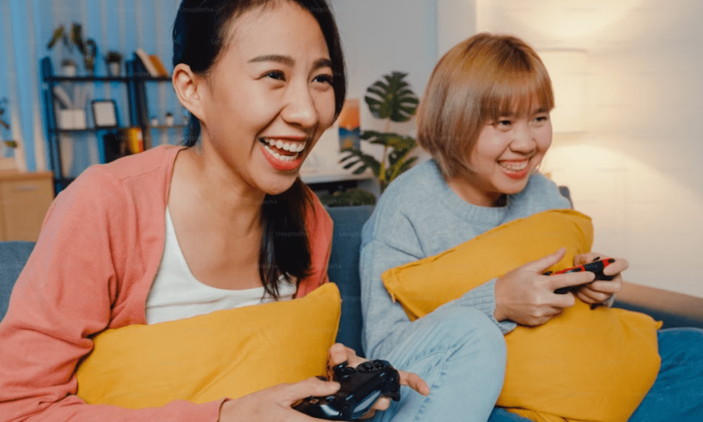 Two women gaming together