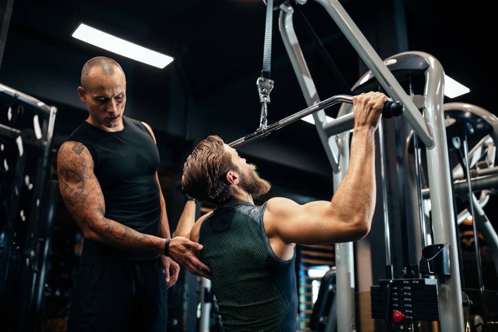 Man working with strength trainer